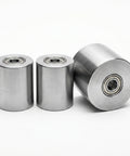 Three metal bearings on a white background