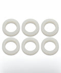 Set of six white circular washers on a white background